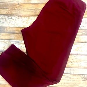 Cropped Okd Navy maroon workout pants with sheer cut outs on the bottom sides
